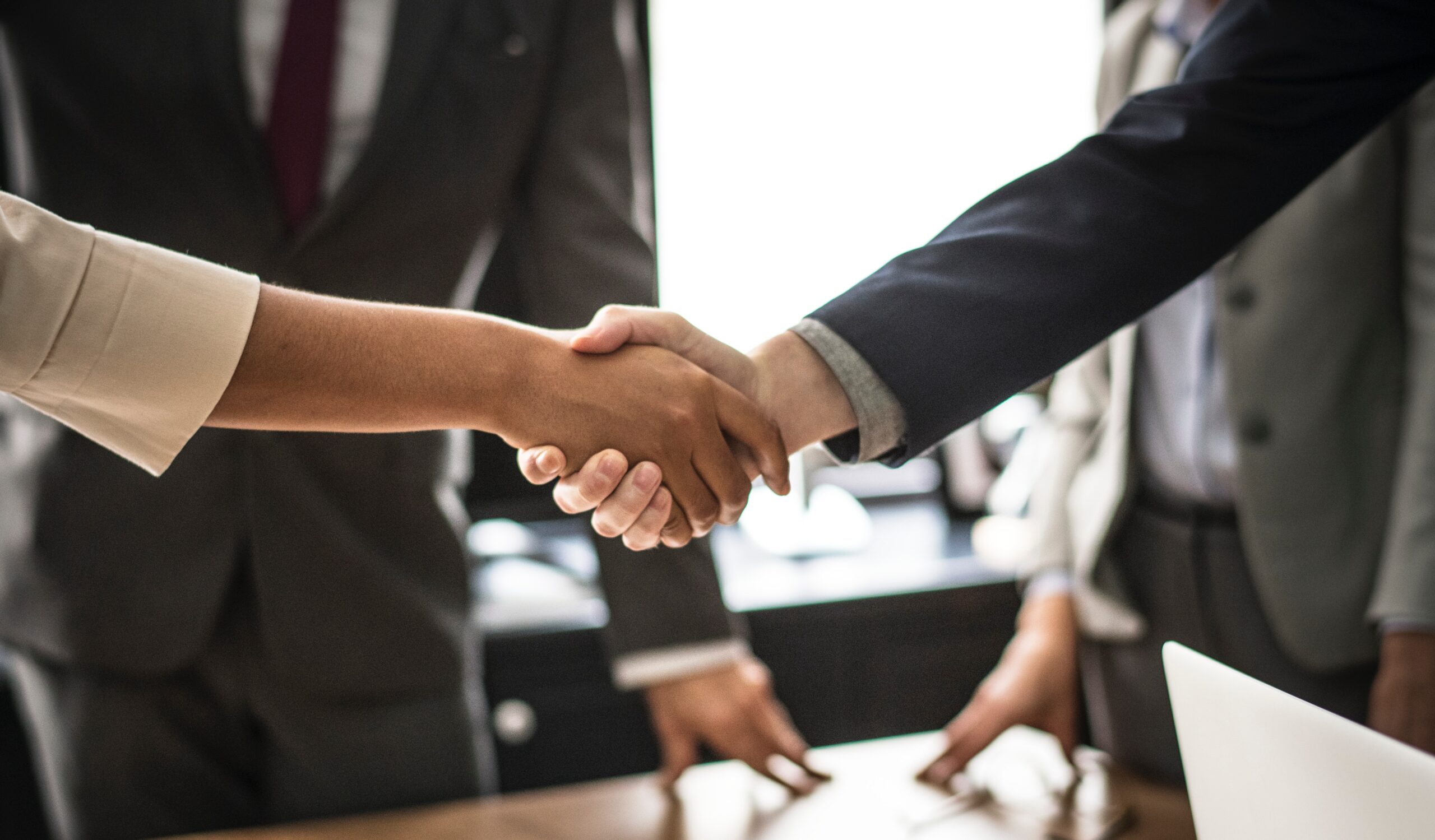 Handshake2. Photo by rawpixel on Unsplash